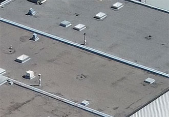 toiture plate en asphalte et gravier à Lasalle