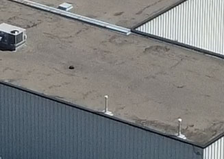 toiture plate en asphalte et gravier à Saint-Léonard