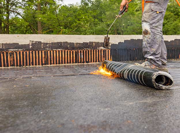 toiture Montréal immeuble membrane élastomère tpo gravier